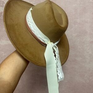 Elegant Brown Hat with Lace Detail